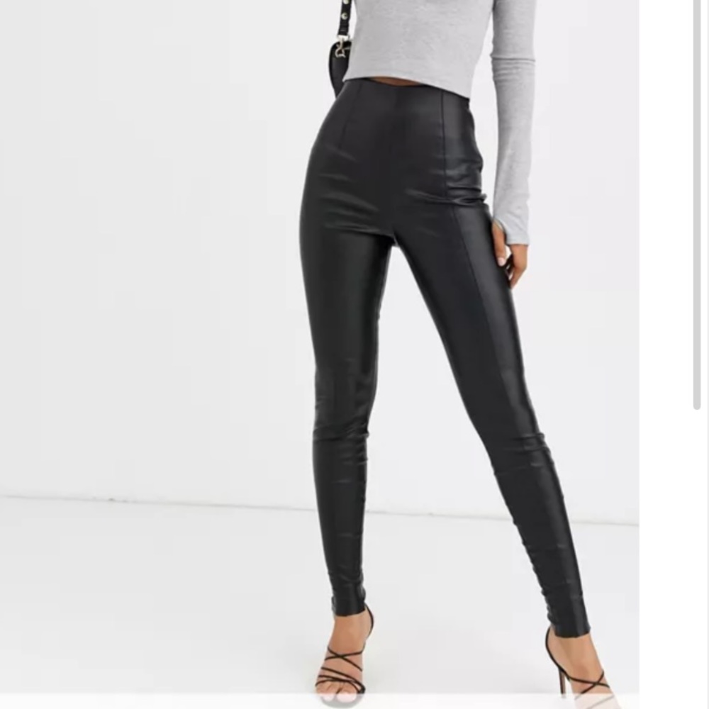 Tight faux leather pants with elastic waist band